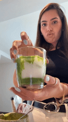 Woman prepares matcha tea and steak dinner in Mexican kitchen