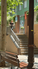 Scooter rider performs stunts on Barcelona stone steps
