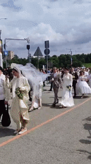 Wedding procession and street gathering in central Moscow