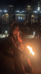 Fire performance on a Da Nang beach draws a nighttime crowd