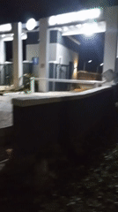 Nighttime activity captured at Bukuru hotel entrance and food stand