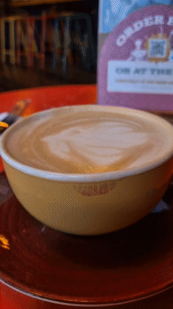 Lipstick-marked cappuccino with latte art observed in West Suffolk