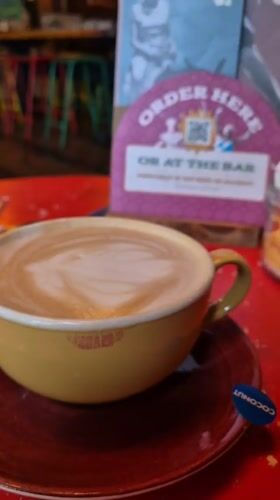 Lipstick-marked cappuccino with latte art observed in West Suffolk
