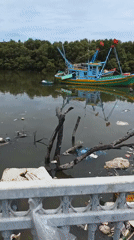 Colorful fishing boats spotted docked in Vietnamese river town