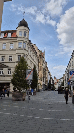 Strolling through Regensburg's historic city center on a summer afternoon
