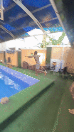 Young man enjoys afternoon swim session in Nkpor pool