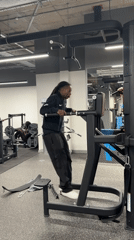 Person performs pull-ups at modern London gym