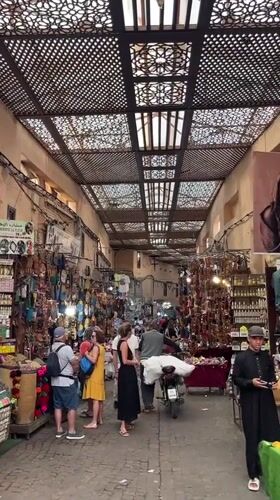 Marrakesh street life captured in bustling souks and plazas