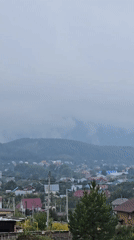 Misty mountain village in Belokurikha on an overcast morning