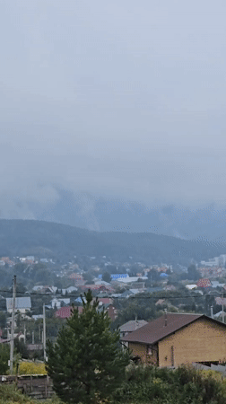 Misty mountain village in Belokurikha on an overcast morning