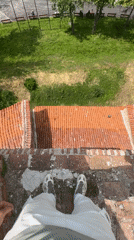 Person stands on building edge in Vidin, Bulgaria