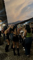 Late-night festival celebration with music and dancing in Amatitán
