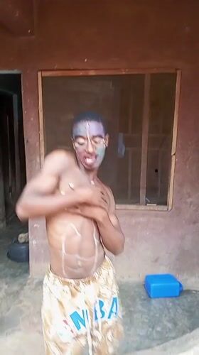 Young man documents painted performance art session in Onitsha