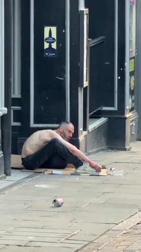 Evening street life documented across Nottingham city center