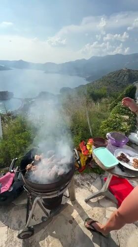 Family barbecue and pool day captured in Sveti Stefan