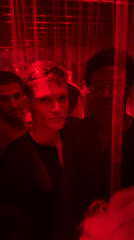 Two people spotted in red-lit crowded London venue