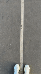 Runner documented on Pont de Bir-Hakeim bridge, Paris morning