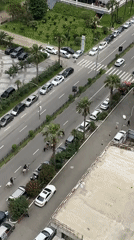Horse riders navigate Batumi street as morning scenes unfold