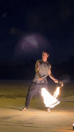Fire performers light up a Batumi night with torches and spinning props