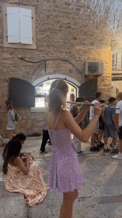 Flute music and evening foot traffic in Budva's old town