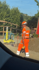 School gathering and road works share a quiet French morning