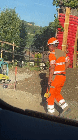 School gathering and road works share a quiet French morning
