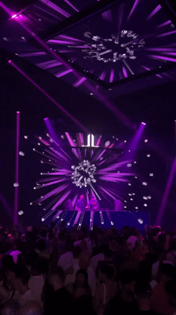 Patong nightclub packed under purple lights with live DJ set