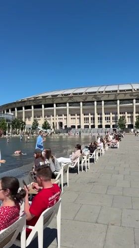 Summer day at Luzhniki — fountains, park, and stadium