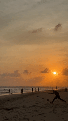 Sunset beach gathering draws families to Sri Lankan coast