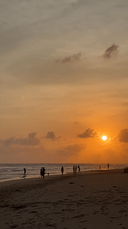 Sunset beach gathering draws families to Sri Lankan coast