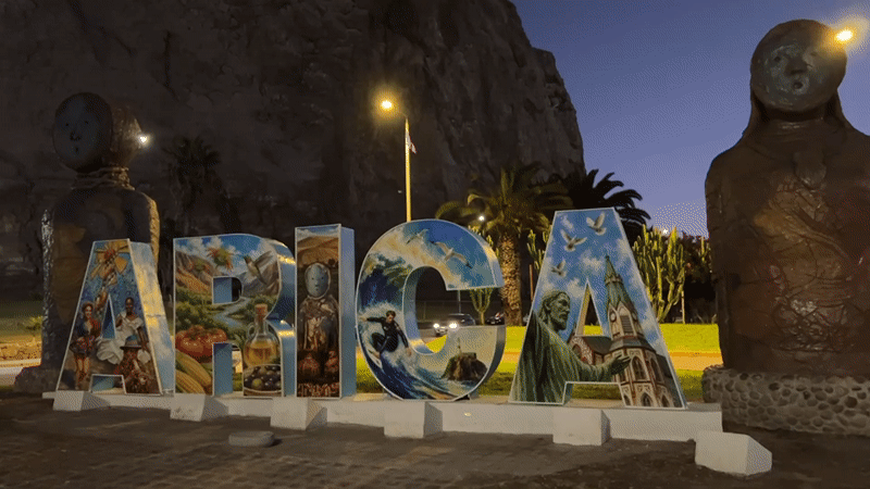 Nighttime tour of Arica's landmarks, signs, and monuments