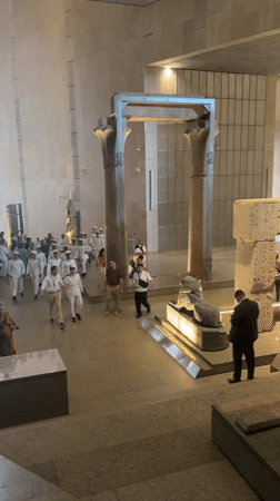 Museum visitor documents Egyptian artifacts at Safaga City Museum