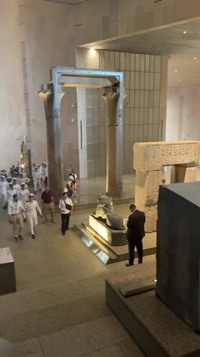 Museum visitor documents Egyptian artifacts at Safaga City Museum
