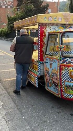 Sicilian street vendor and boutique shopping captured in Taormina