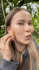 Woman's morning makeup routine documented in Chaikovsky, Russia