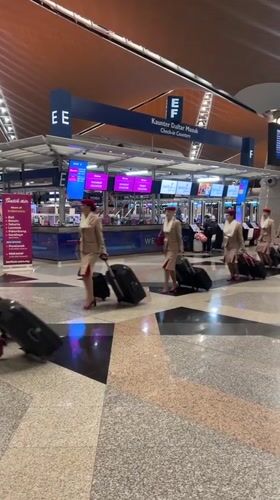 Cabin crew and terminal scenes captured at KLIA