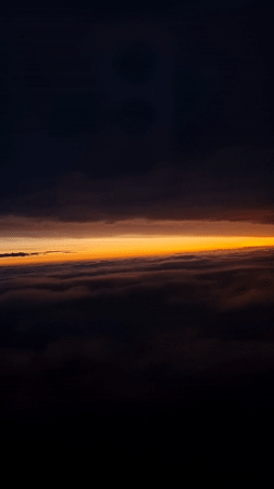Dawn aerial view captured above clouds near Rebrovo, Bulgaria