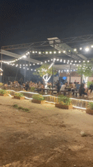 Vietnamese restaurant operates under string lights with outdoor seating