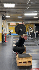 Man performs weightlifting routine at Blagoveshchensk gym