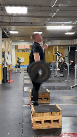 Man performs weightlifting routine at Blagoveshchensk gym