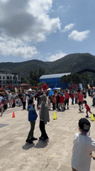 Public gathering with Bugs Bunny balloon in Fethiye square