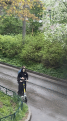 Two people share electric scooter ride in Staraya, Russia