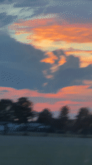 Pastel sunset sky drifts past a small Bavarian town.