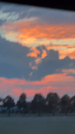 Pastel sunset sky drifts past a small Bavarian town.