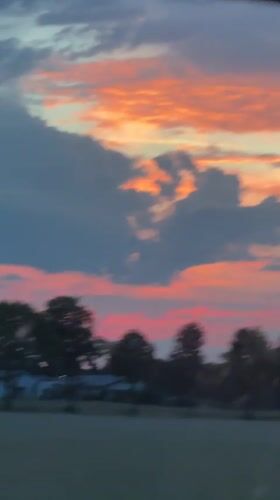 Pastel sunset sky drifts past a small Bavarian town.