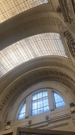 Tourist captures upward views of Milan's Galleria Vittorio Emanuele II