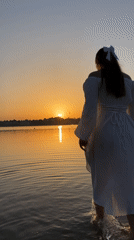 Sunset on the Ternopil Reservoir: water, dresses, and ducks