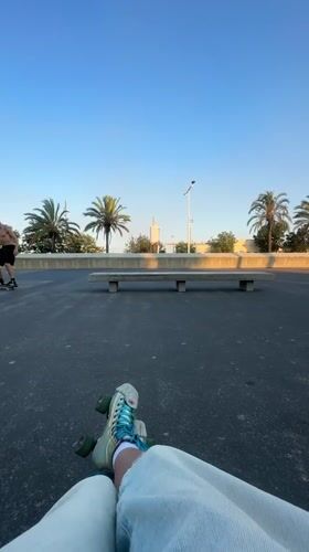 Skaters at a Barcelona plaza, bench tricks and roller skates