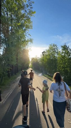 Daily life scenes captured across Mezhdurechensk parks and paths