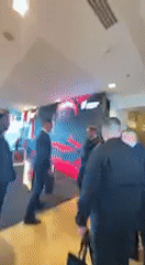 Military uniformed speaker addresses conference audience in Kyiv